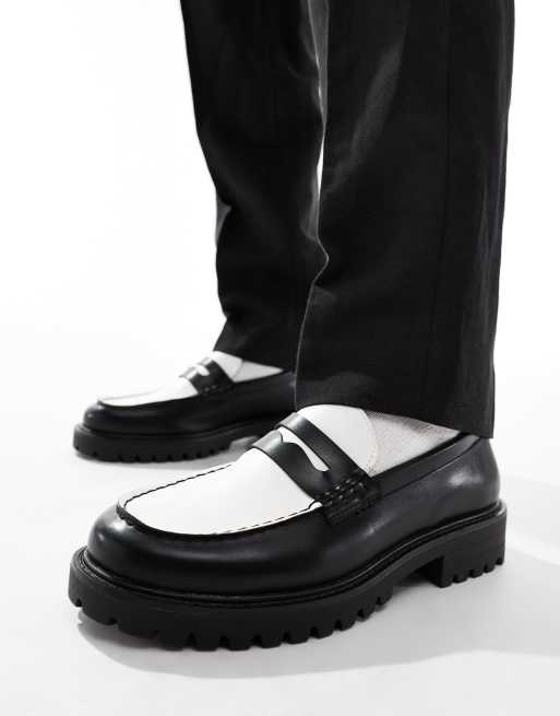 Truffle Collection - Penny loafers met dikke zool in zwart en wit