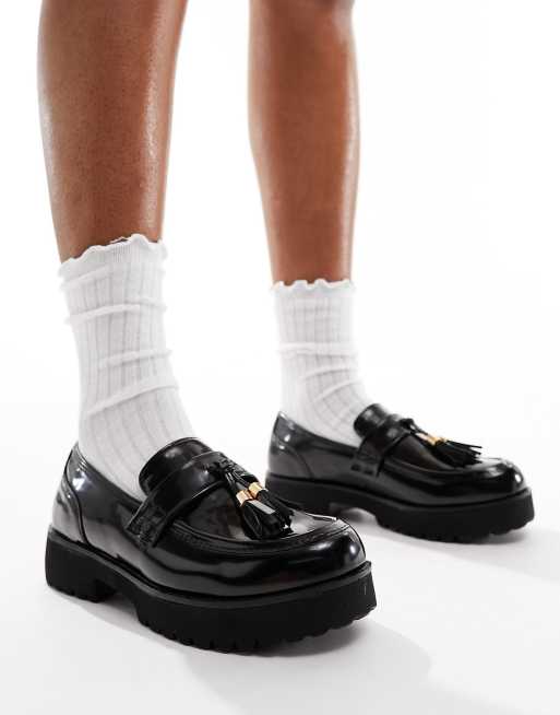 Truffle Collection - Penny loafers met kwastjes in zwart