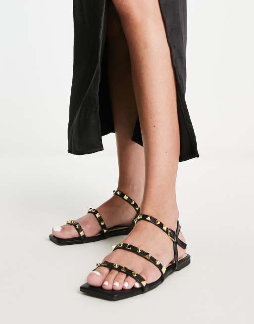 Truffle Collection - Platte sandalen met bandjes en studs in zwart
