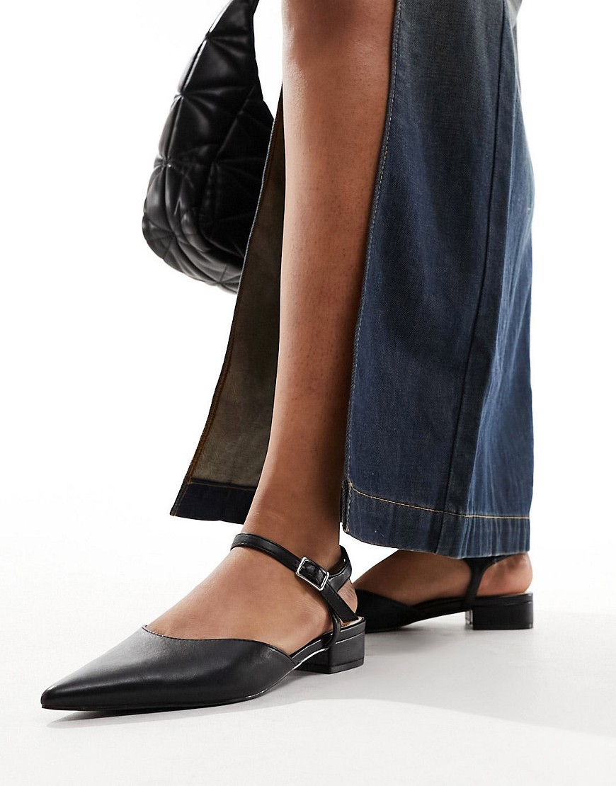 pointed heeled mules in black