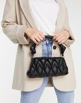 Truffle Collection puffer quilted tote bag with knotted strap in black