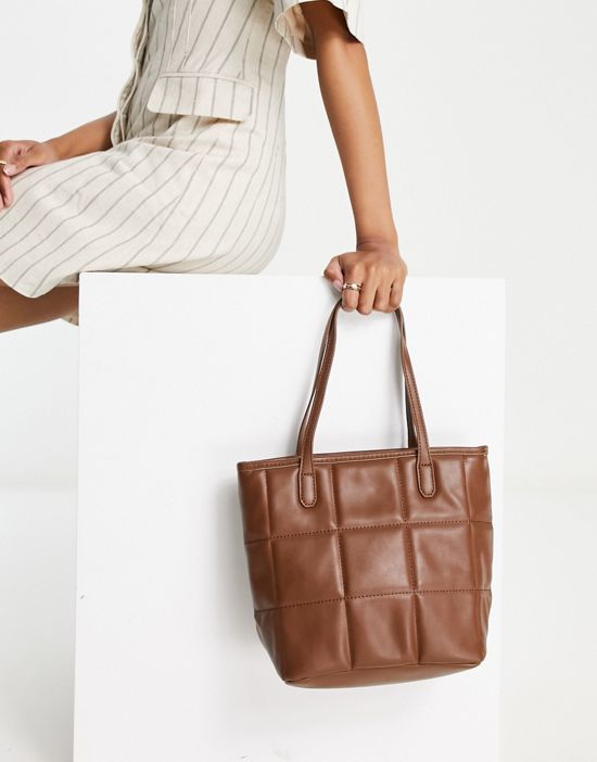 https://images.asos-media.com/products/truffle-collection-quilted-shopper-bag-in-brown/201975113-2?$n_550w$&wid=550&fit=constrain