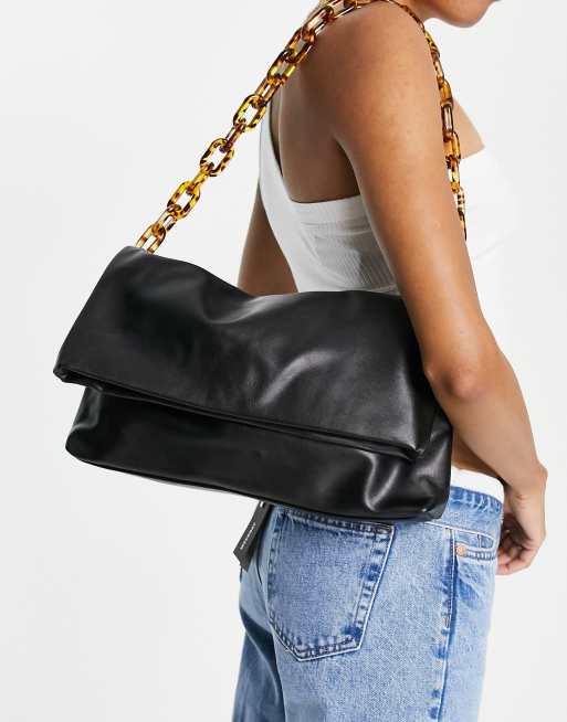 Truffle Collection – Schultertasche in Schwarz mit breiter Kette