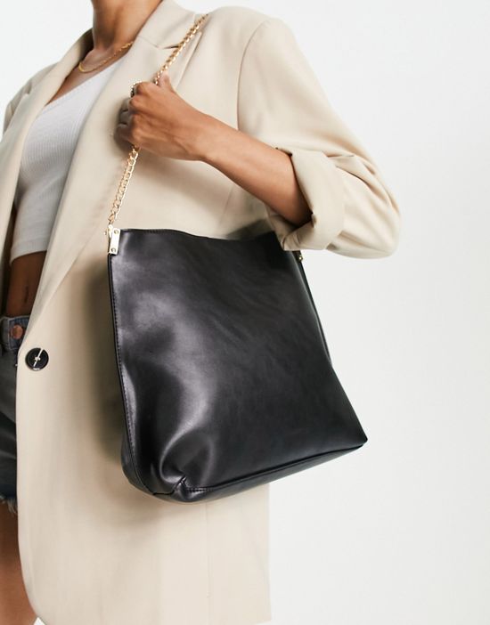 https://images.asos-media.com/products/truffle-collection-shoulder-bag-in-black/201975056-1-black?$n_550w$&wid=550&fit=constrain