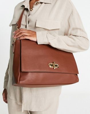 Truffle Collection slouchy cross body bag with chain strap and twist lock in tan
