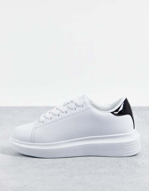 Truffle Collection – Sneaker in Weiß mit schwarzer Zierlasche