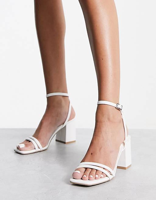 Under ~ Formode væbner Truffle Collection square toe block heel barely there sandals in white |  ASOS