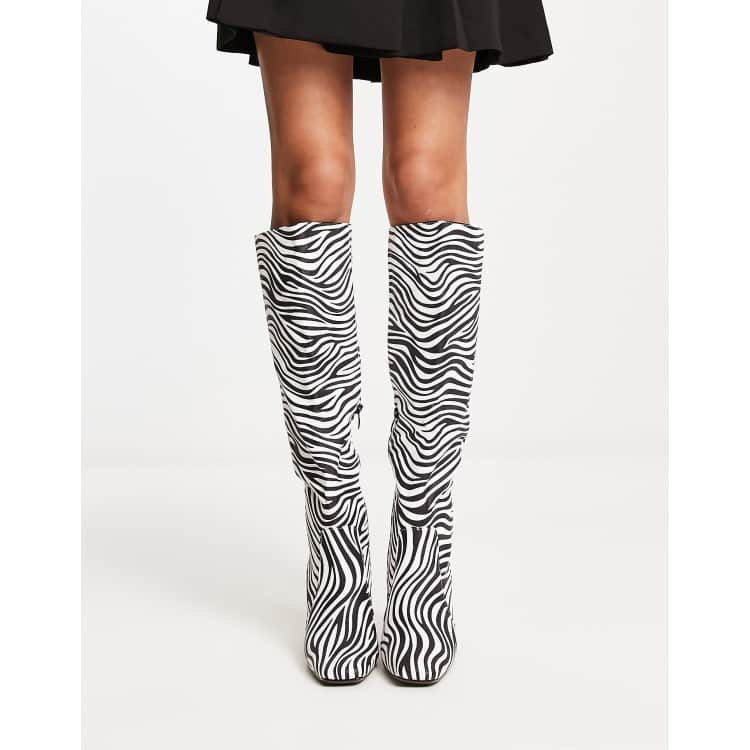 Truffle Collection square toe heeled knee boots in zebra print | ASOS