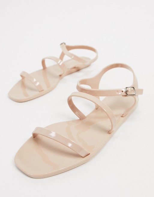 Truffle Collection square toe jelly flat sandals in beige