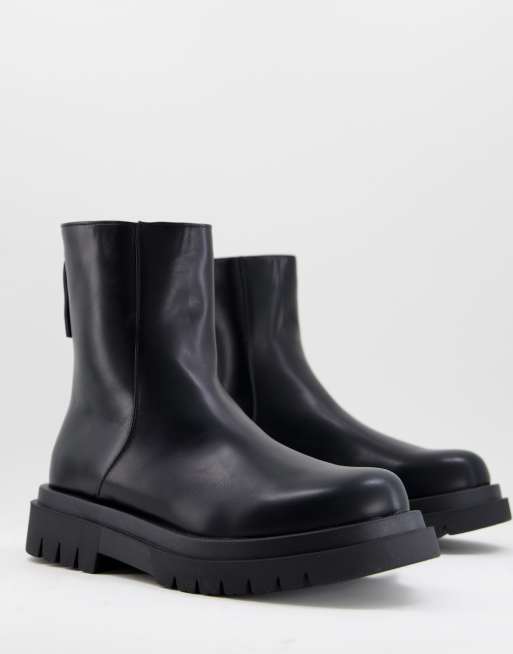 Truffle Collection - Stivaletti in pelle sintetica nera con suola spessa e zip sul retro