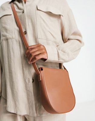 Truffle Collection structured saddle bag in light tan