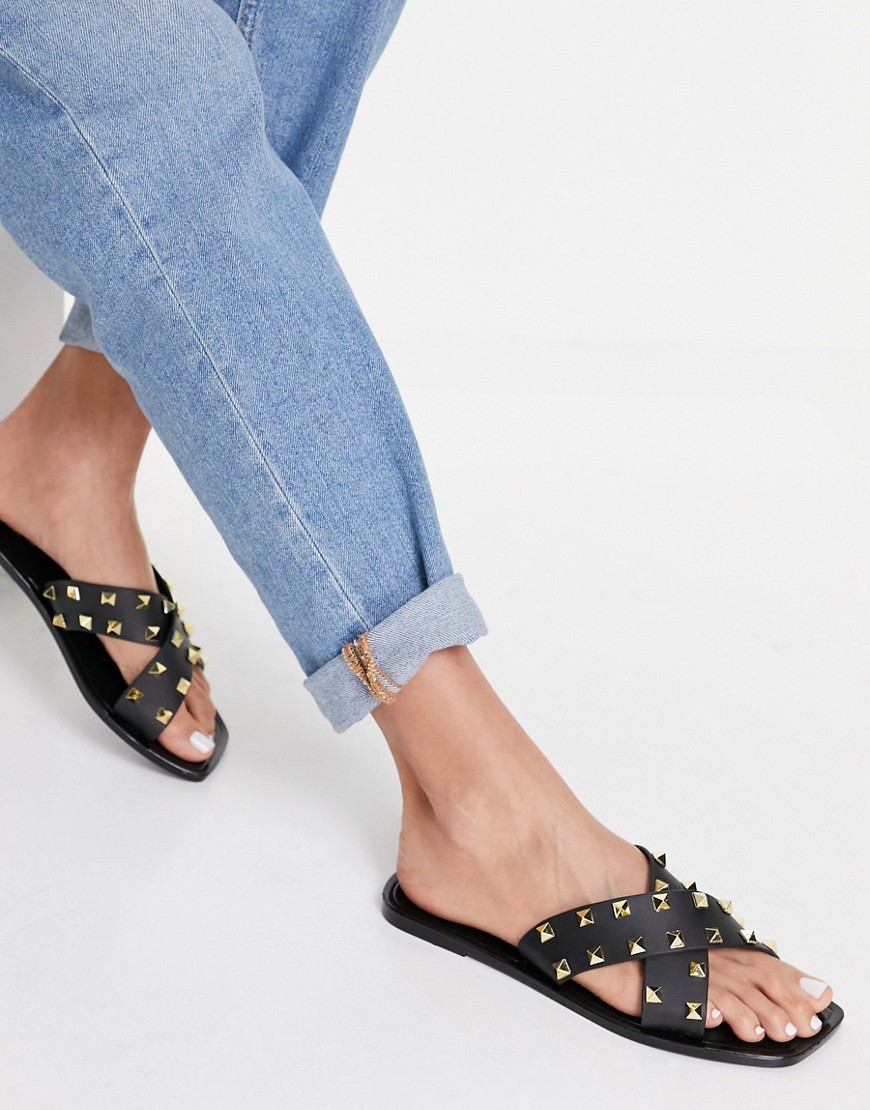 Truffle Collection studded cross strap jelly sandals in black