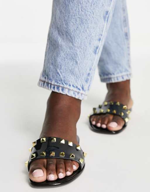 Truffle Collection studded jelly slides in black