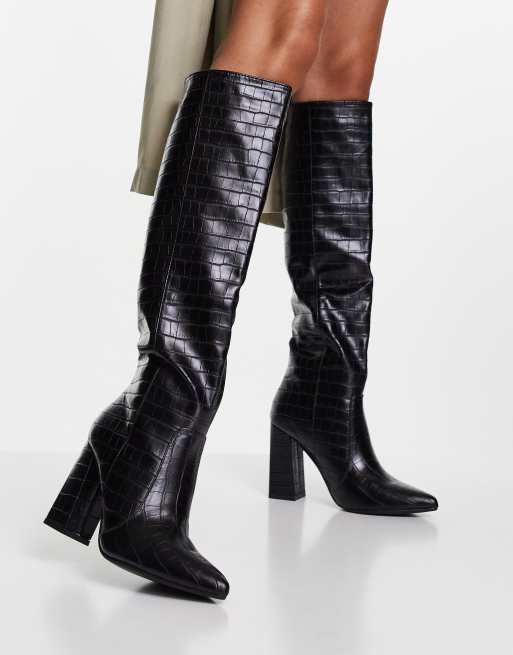 Truffle Collection – Svarta knähöga boots i dra på-modell