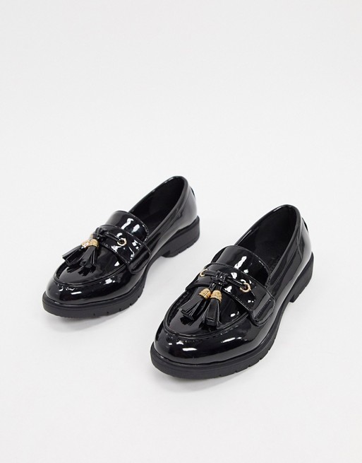 Truffle Collection tassel loafers in black