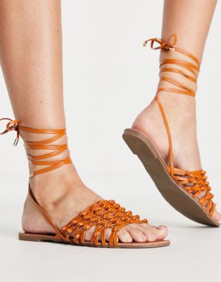 Truffle Collection tie leg flat sandals in orange