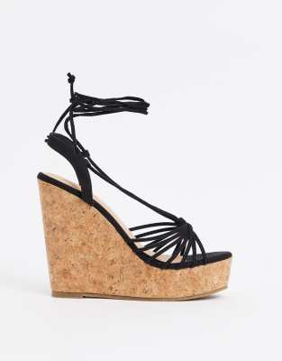 Truffle Collection Truffle Collection tie leg glam wedges in black