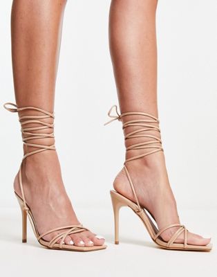 Truffle Collection Tie Leg Stilletto Heeled Sandals With Square Toe In Beige-neutral