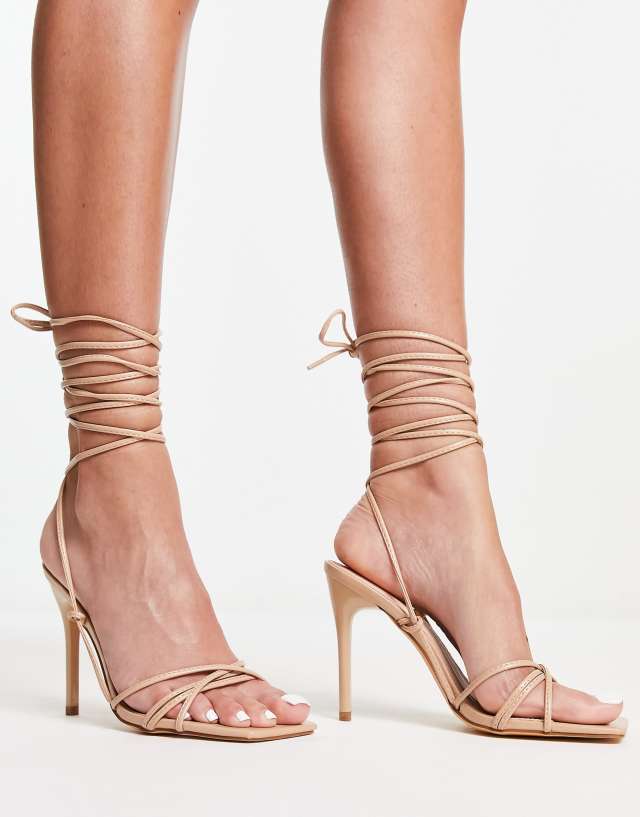 Truffle Collection - tie leg stilletto heeled sandals with square toe in beige