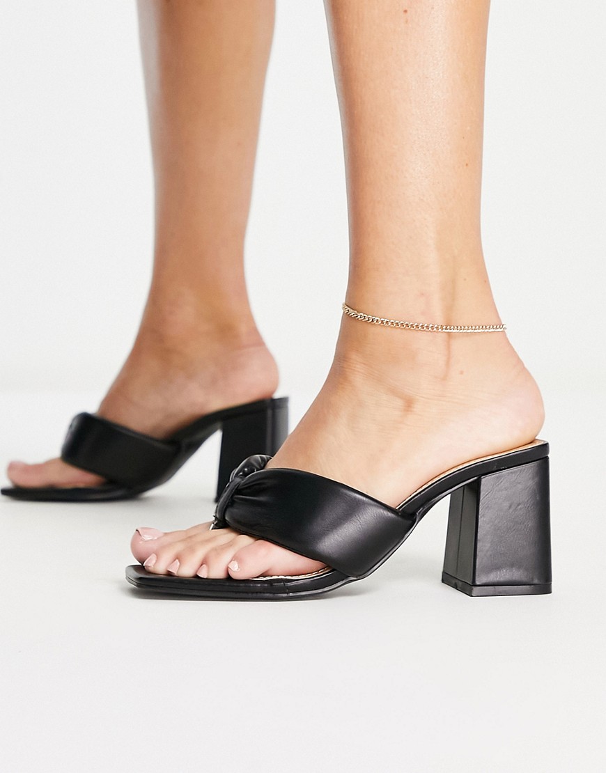 Truffle Collection toe post heeled mules in black