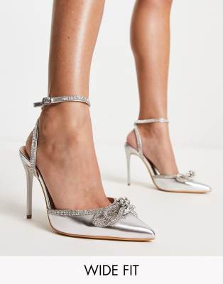 Truffle Collection Wide Fit bow embellished clear pointed heeled shoes in silver