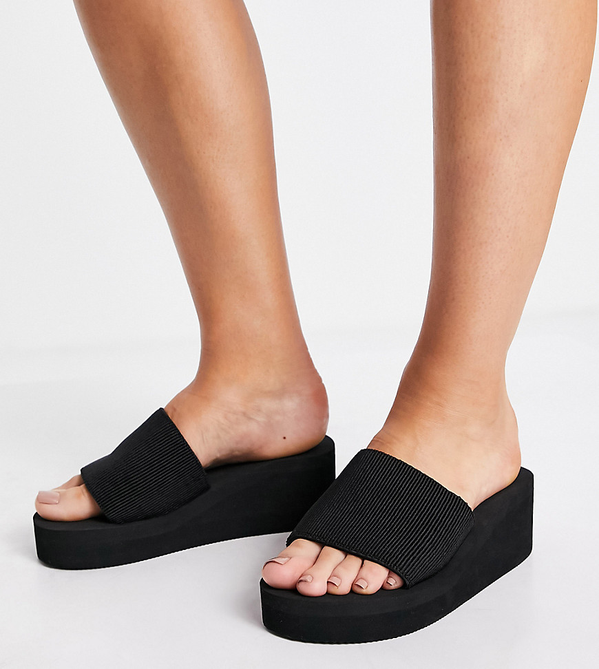 Truffle Collection wide fit chunky glam mules in black