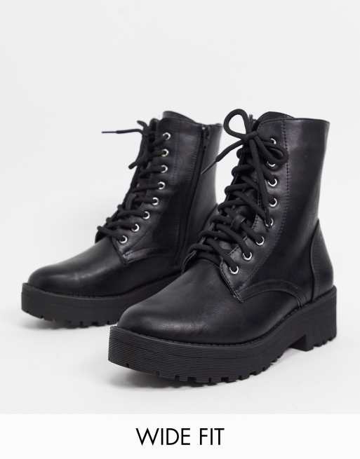 tan boots with black tights