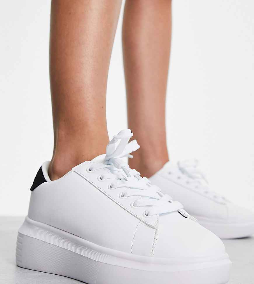 Truffle Collection Wide Fit chunky sole sneakers in white with black back tab