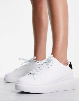 white trainers with black back