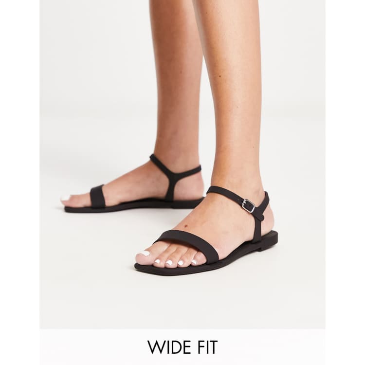 Truffle Collection Wide Fit jelly sandals in black ASOS