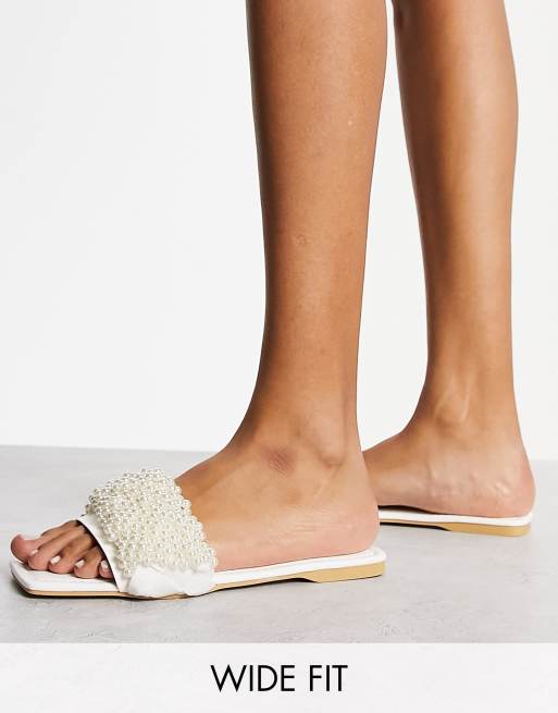 Truffle Collection Wide Fit plaited pearl sliders in white | ASOS