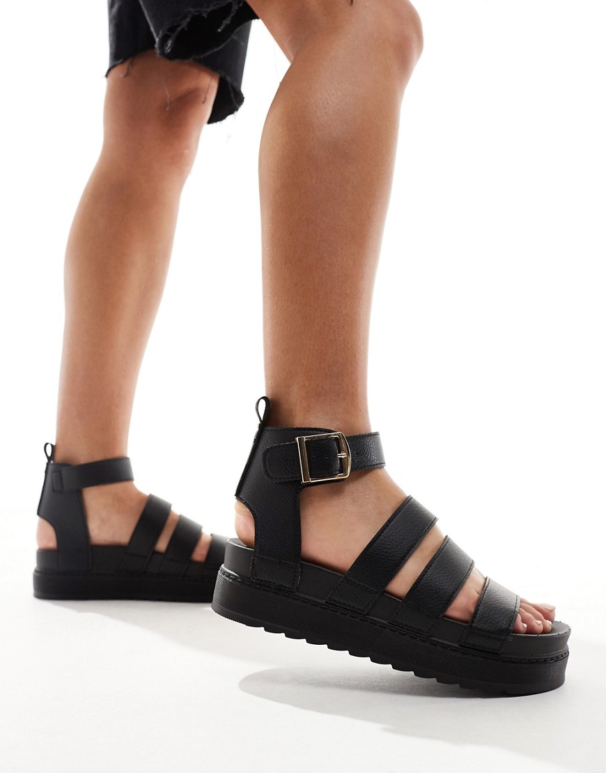 Truffle Collection wide strap sandals in black
