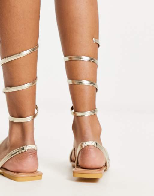 Truffle Collection wrap around minimal sandals in gold metallic ASOS