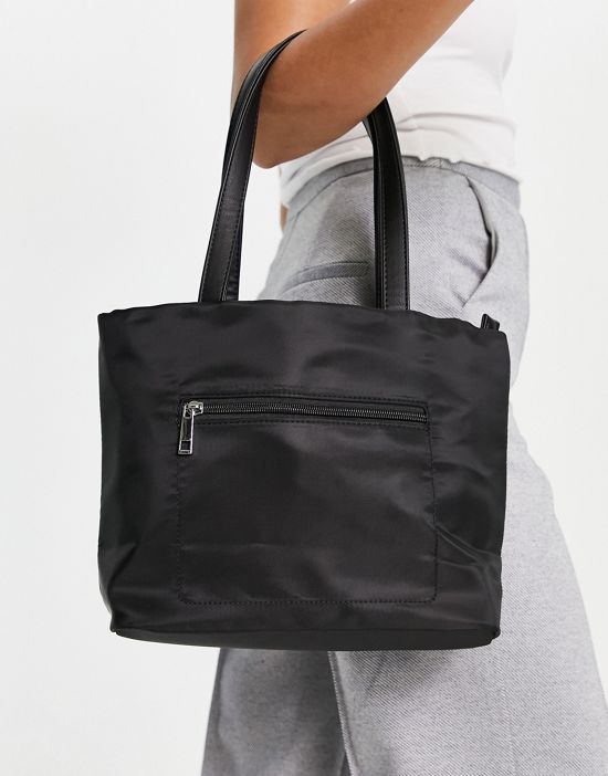 https://images.asos-media.com/products/truffle-collection-zip-pocket-tote-bag-in-black/201975092-1-black?$n_550w$&wid=550&fit=constrain