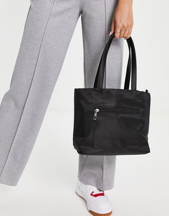 https://images.asos-media.com/products/truffle-collection-zip-pocket-tote-bag-in-black/201975092-2?$n_550w$&wid=550&fit=constrain