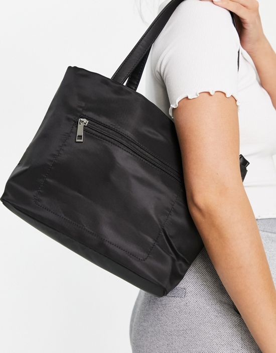 https://images.asos-media.com/products/truffle-collection-zip-pocket-tote-bag-in-black/201975092-4?$n_550w$&wid=550&fit=constrain