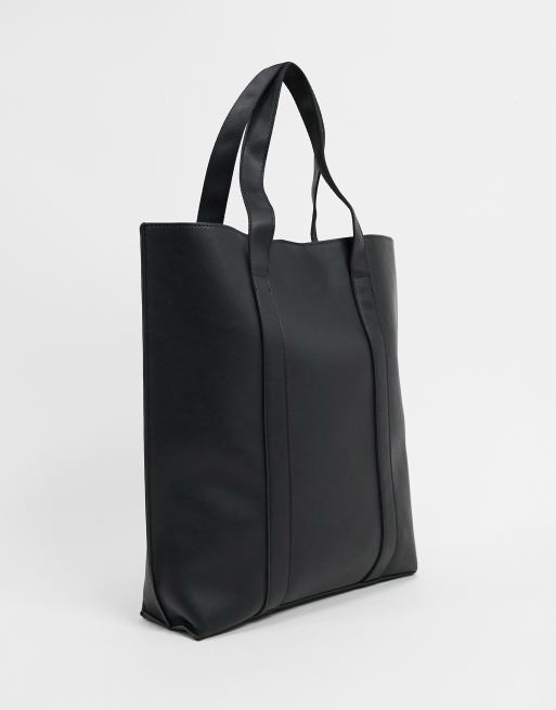 Pin on black structered bag