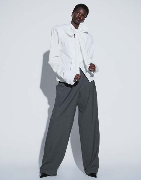 TTYA tailored pleated pants with waistband detail in gray - view 1