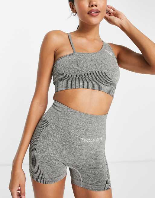 Twill Active - Sømløs sports-BH med asymmetrisk design i petroleumsfarve