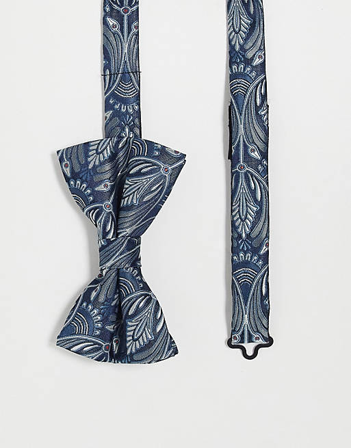 Twisted Tailor bow tie in blue with peacock design | ASOS