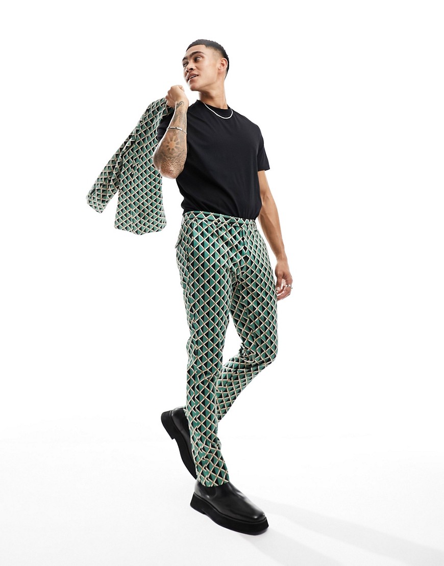 Twisted Tailor shadoff suit trousers in green with geometric vintage print