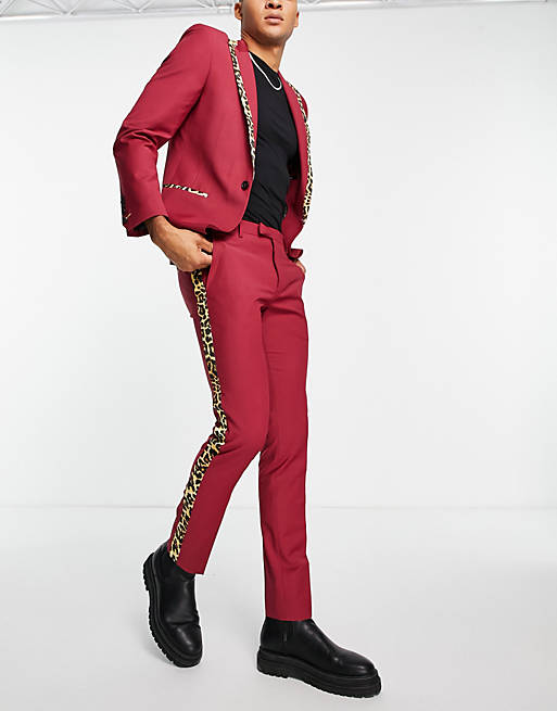 Twisted Tailor suit trousers in red with leopard print side stripe