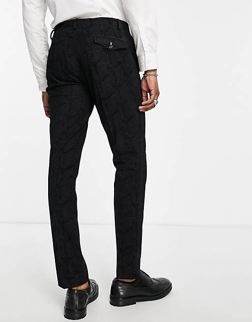Men Twisted Tailor Sylvan skinny suit trousers in black with geometric flocking 