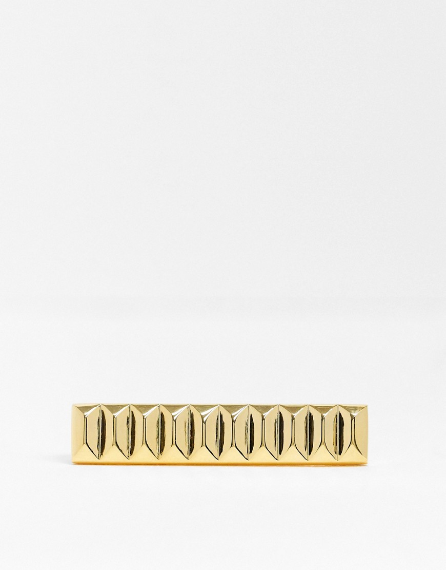 Twisted Tailor tie bar with brick detail in gold