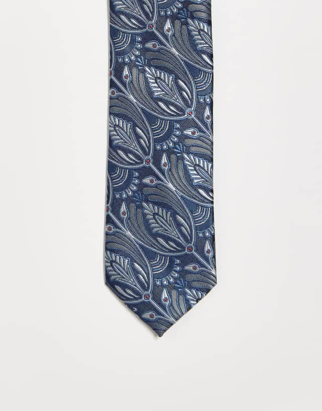 Twisted Tailor tie in blue with peacock design