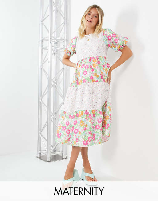 Twisted Wunder Maternity – Midi-Hängerkleid mit Patchwork-Blumenmuster