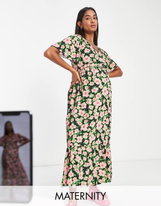 Twisted Wunder Maternity – Midi-Wickelkleid mit frühlingshaftem Blumenmuster