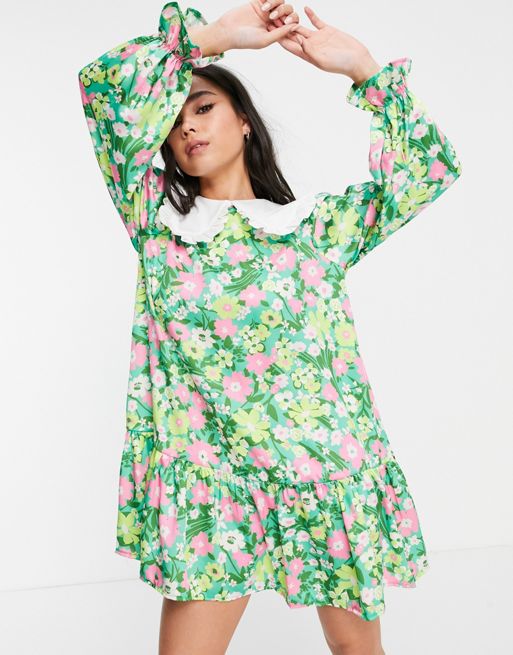 Twisted Wunder mini smock dress with bib collar in green base painted floral