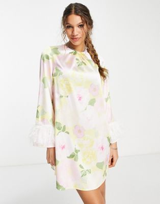 Twisted Wunder mini shift dress with faux feather cuffs in yellow blossom print