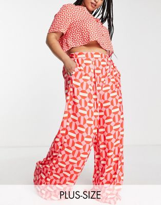 Twisted Wunder Plus wide leg trousers in pink geo print co-ord